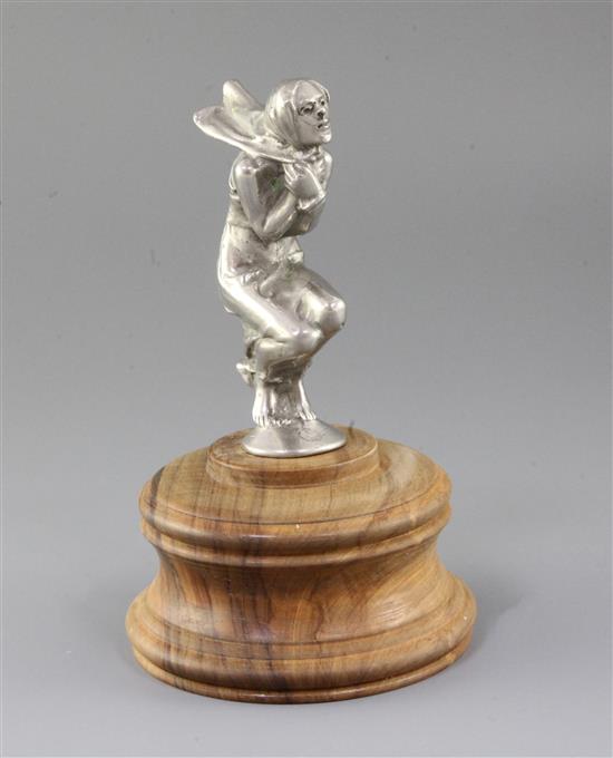An Art Deco Windy Lady car mascot, on wood stand height 18cm
